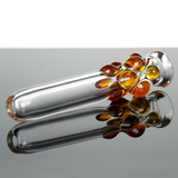 clear glass one hitter smoking pipe with amber honey